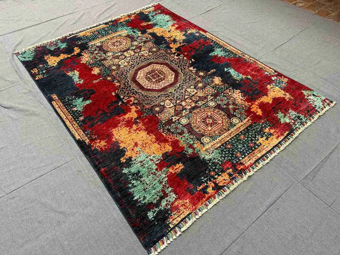 Room layout showcasing large 5x7 Persian-inspired oriental carpet