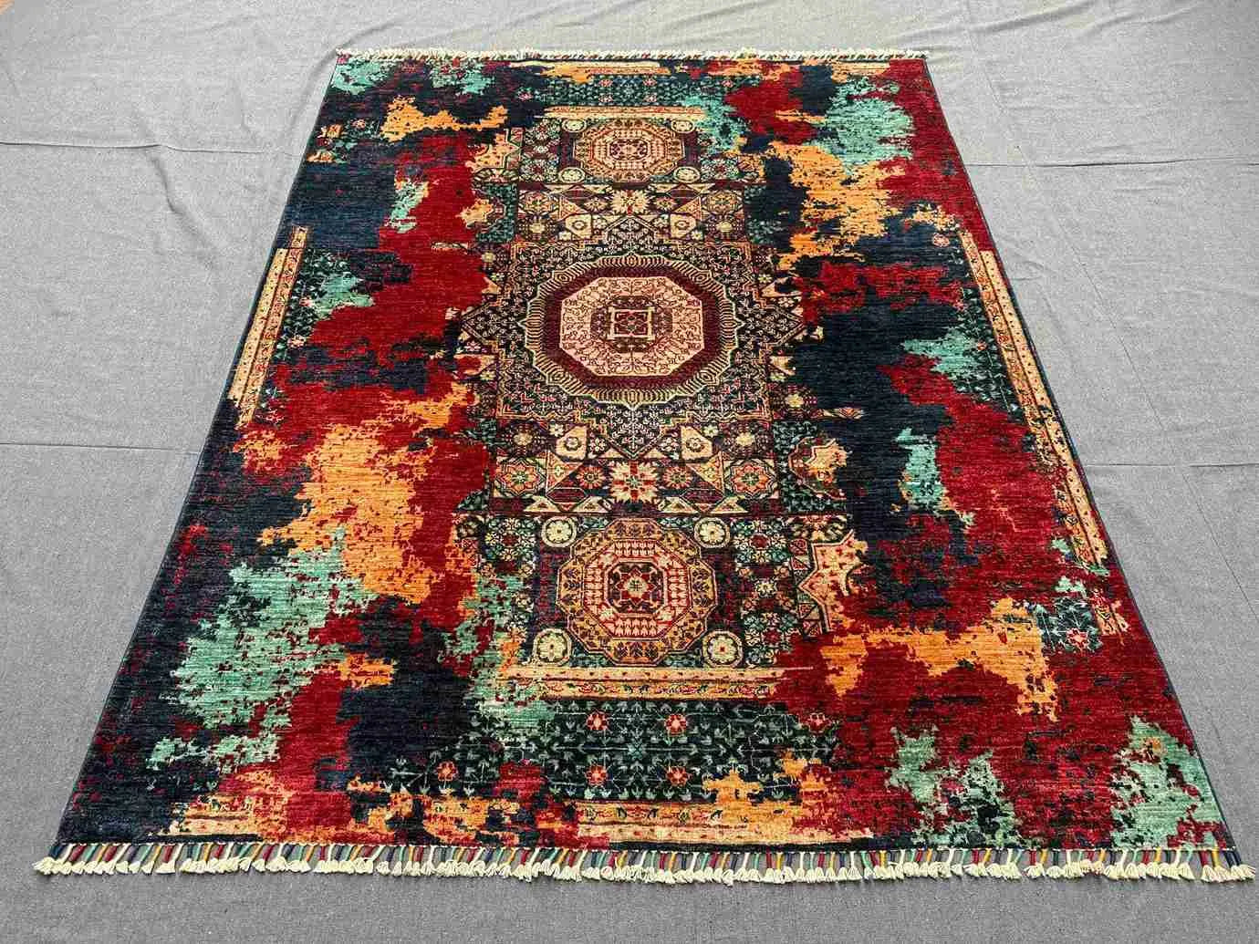 5x7 modern oriental rug placed in living room with bold decor