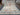 Full top-down view of large Turkish Oushak rug with pastel floral design