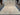 Top-down full image of 9x12 handmade Oushak rug with vibrant floral motifs