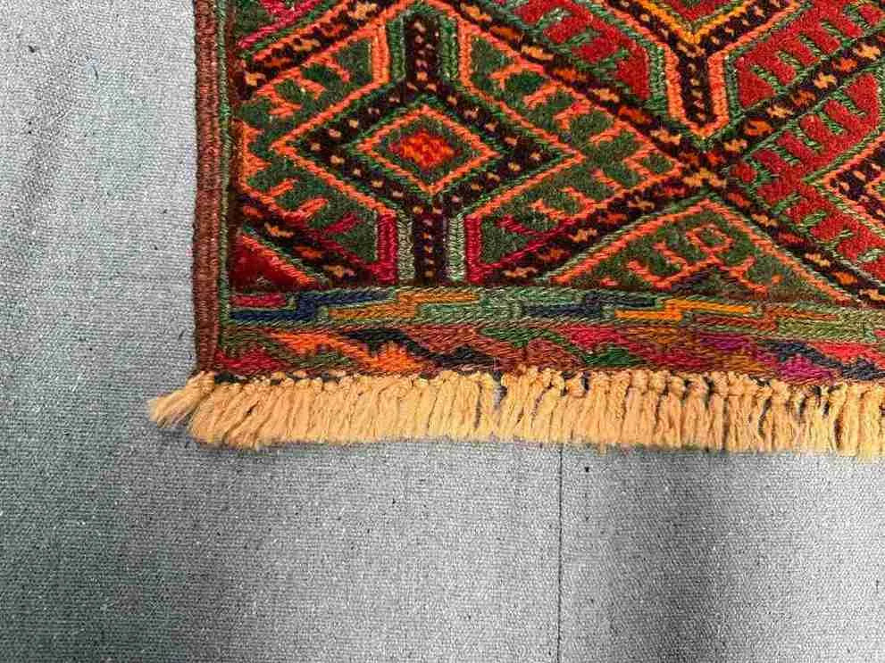 Corner weave detail of wool handmade Afghan rug
