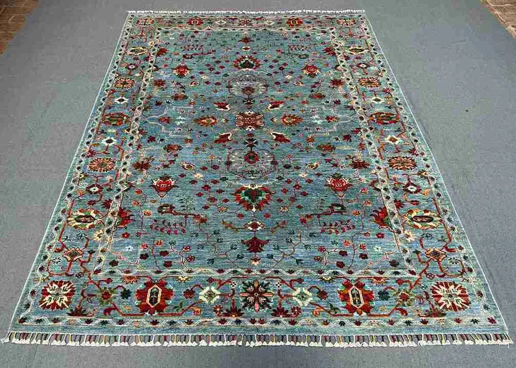 Modern floral area rug in cozy interior setting
