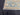 Corner design detail on 6x8 Blue Khotan Oriental Rug