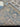 Angled folded view of 6x8 Blue Khotan Wool & Silk Rug