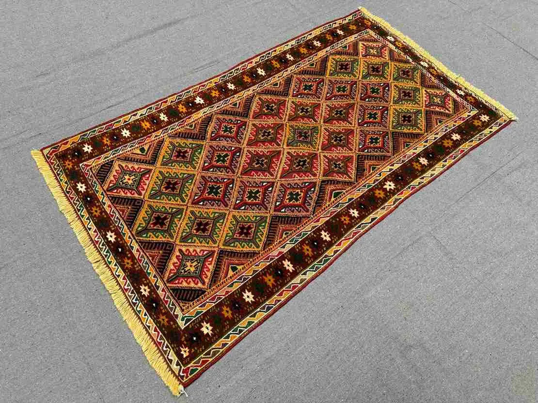 Boho hallway decor styled with vintage Afghan wool kilim rug
