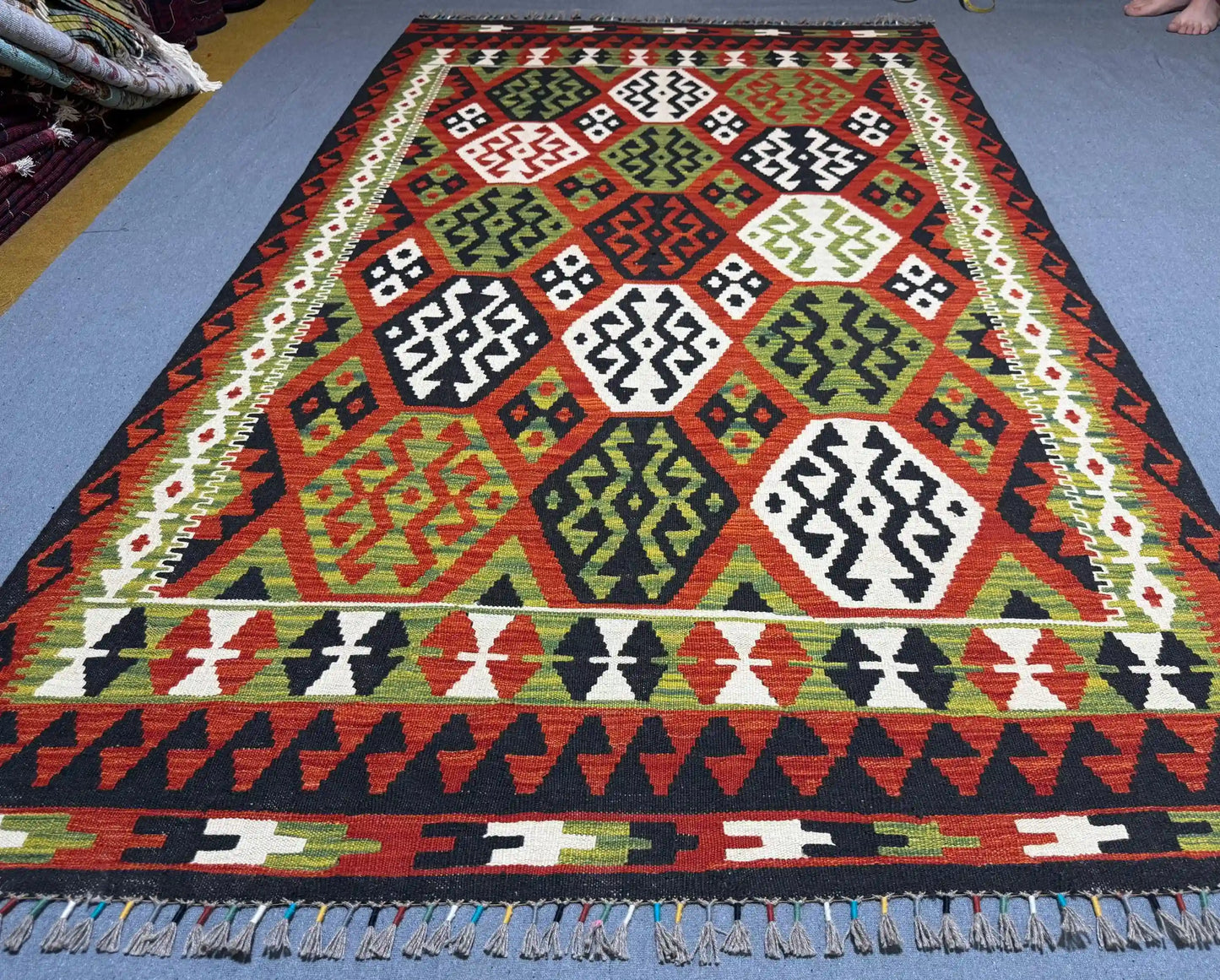 Boho-style handmade Kilim rug enhancing living room décor