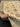 Authentic 6x8 Chobi carpet in hands showing hand-knotted wool texture