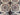 Detailed pattern of handmade Persian-style Afghan rug in red and beige