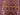 Color detail in dark red, gold, and brown on oriental tribal carpet