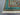Detailed corner of hand-knotted Mamluk Oriental rug – turquoise and green wool silk
