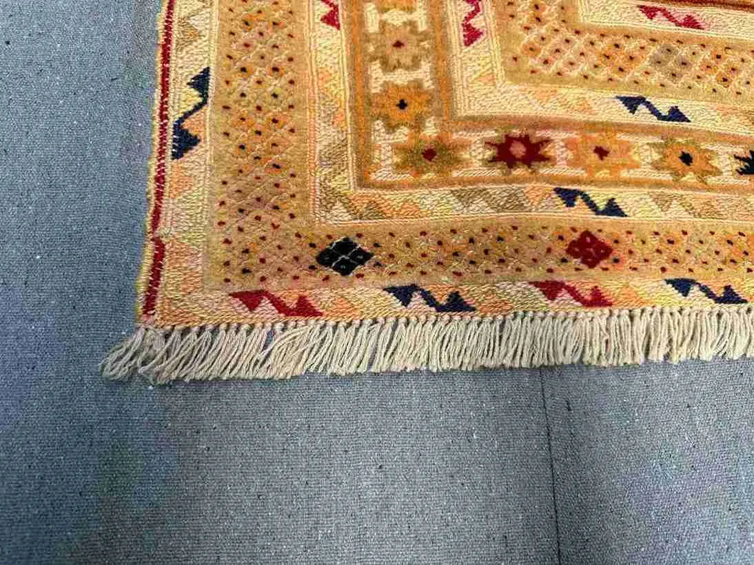 Corner detail showing precise handwoven knotting on Afghan Turkish tribal rug