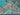 Edge fold detail of Tree of Life handmade turquoise wool rug