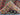 Folded view of Afghan tribal kilim rug showing edge detail
