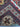 Folded view of handmade multicolor wool silk rug with tribal detail