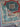 Folded view of 5x7 red and green Mamluk rug showcasing knot density