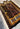 Folded Persian silk rug showing flexibility and pattern