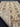 Knotted beige Persian Chobi rug 5x7 ft folded – wool craftsmanship.