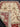 Close-up of folded Persian-style rug showing texture and design