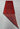 Folded red handmade runner rug showing back weave and durable Turkish knots