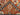 Backside weave shown on folded Rust & Navy Suzani rug