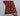 Folded view of Afghan red and beige tribal rug showing hand-knotted back