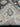 Folded handmade Turkish Oushak rug in black and cream