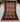 Full view of authentic handmade Baluch rug in beige and burgundy