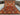 Full view of 8.10x12.2 ft Rust & Navy Suzani Oriental area rug