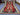 Full flat view of 4.1x6.1 ft Turkish Kilim rug – red, green, black, olive.