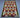 Geometric Turkish Kilim rug laid flat on hardwood floor