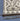 Corner detail of handmade gray kilim runner showcasing geometric weaving