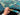 Close view of artisan Turkish wool Mamluk rug held in hands