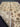 Folded view of wool hand-knotted floral area rug