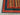 Wool texture and stripe close-up of colorful Afghan shawl carpet.