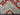 Handwoven oriental rug folded to highlight fine craftsmanship and knotting