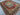 Handmade Heriz rug styled on living room floor with furniture