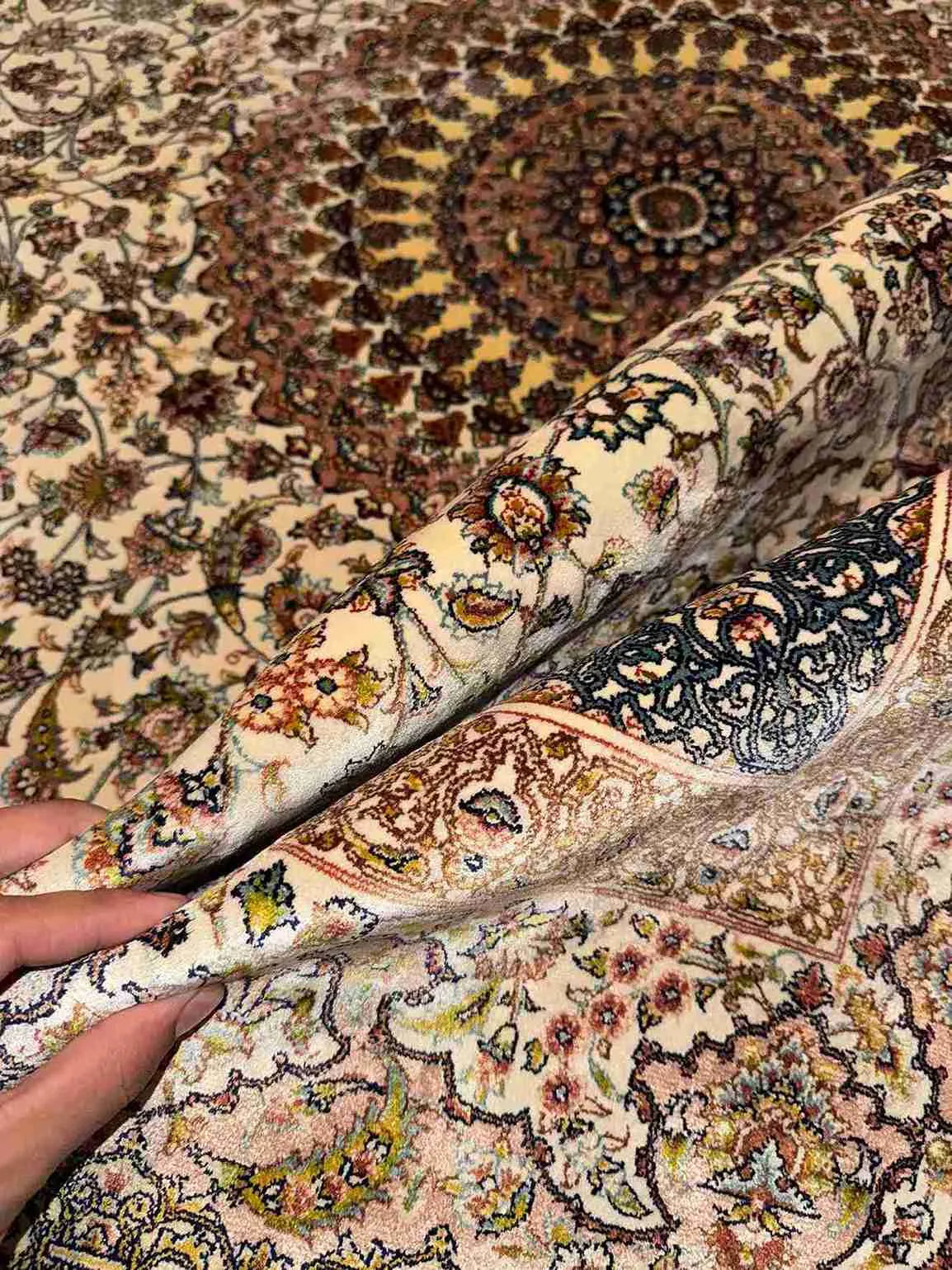 Handmade Ivory Silk Rug - In-Hand Texture View