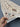 Handmade ivory Sultani runner rug held in hands showcasing fine texture
