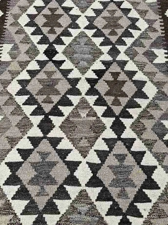 Close-up of flatweave Kilim runner texture – earthy handmade wool