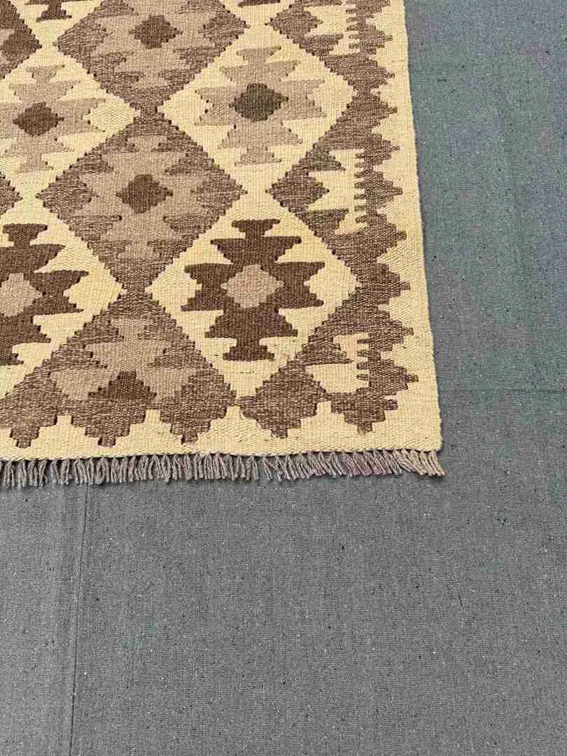 Corner detail of Turkish handmade Kilim runner rug