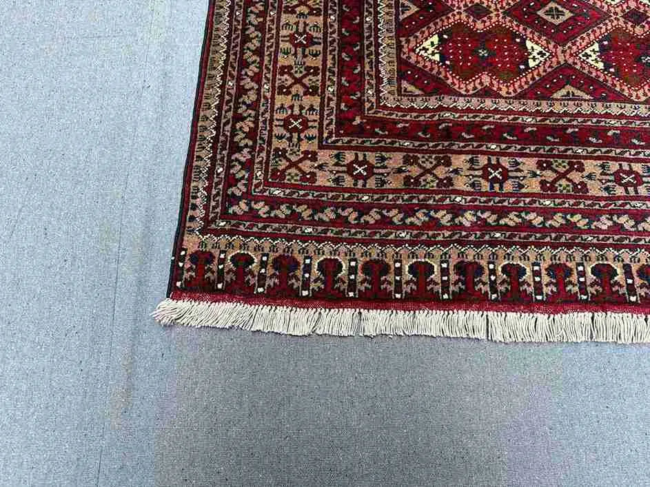 Corner detail of luxury handmade Oriental rug – Afghan Turkish design