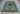 Full room layout featuring Persian-style Mamluk Oriental rug – 5x8