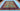 8x10 multicolor Oriental rug styled in a living room