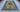 Display of handwoven Oriental area rug in home – 7x10 multicolor wool silk