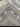 Folded handmade Oushak rug emphasizing fine detailing