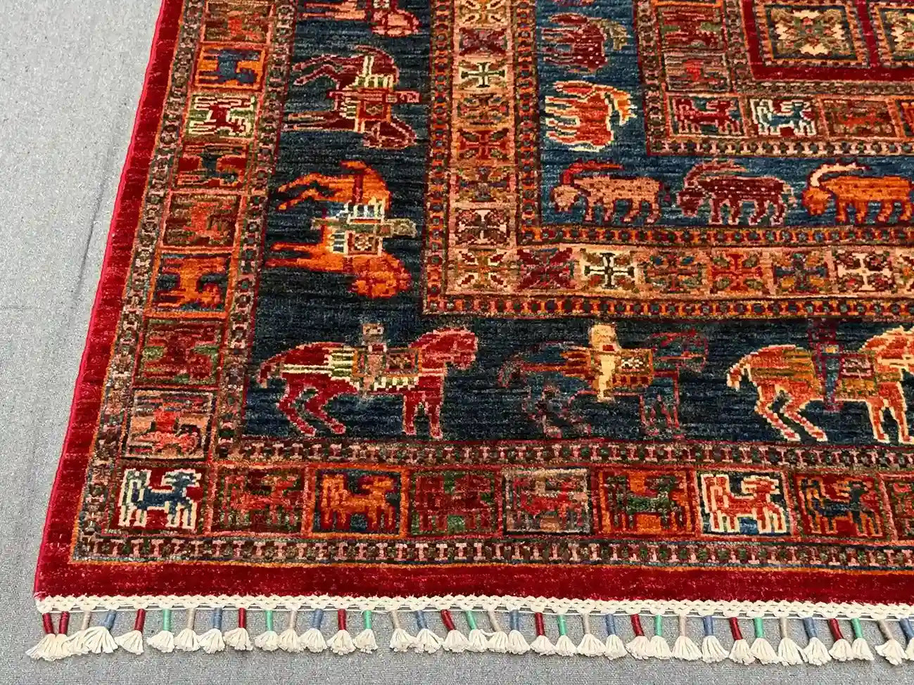 Corner detail of handmade Pazyryk wool rug – geometric tribal art
