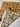 Handmade Persian silk rug partially folded – reveals soft wool-silk pile