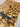 Soft wool-silk Persian area rug on hardwood floor – texture and pattern view
