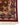 Corner detail of 5x7 Persian silk area rug – floral medallion pattern
