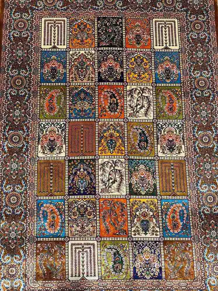 Fine texture and artisan knotted details in silk patchwork rug